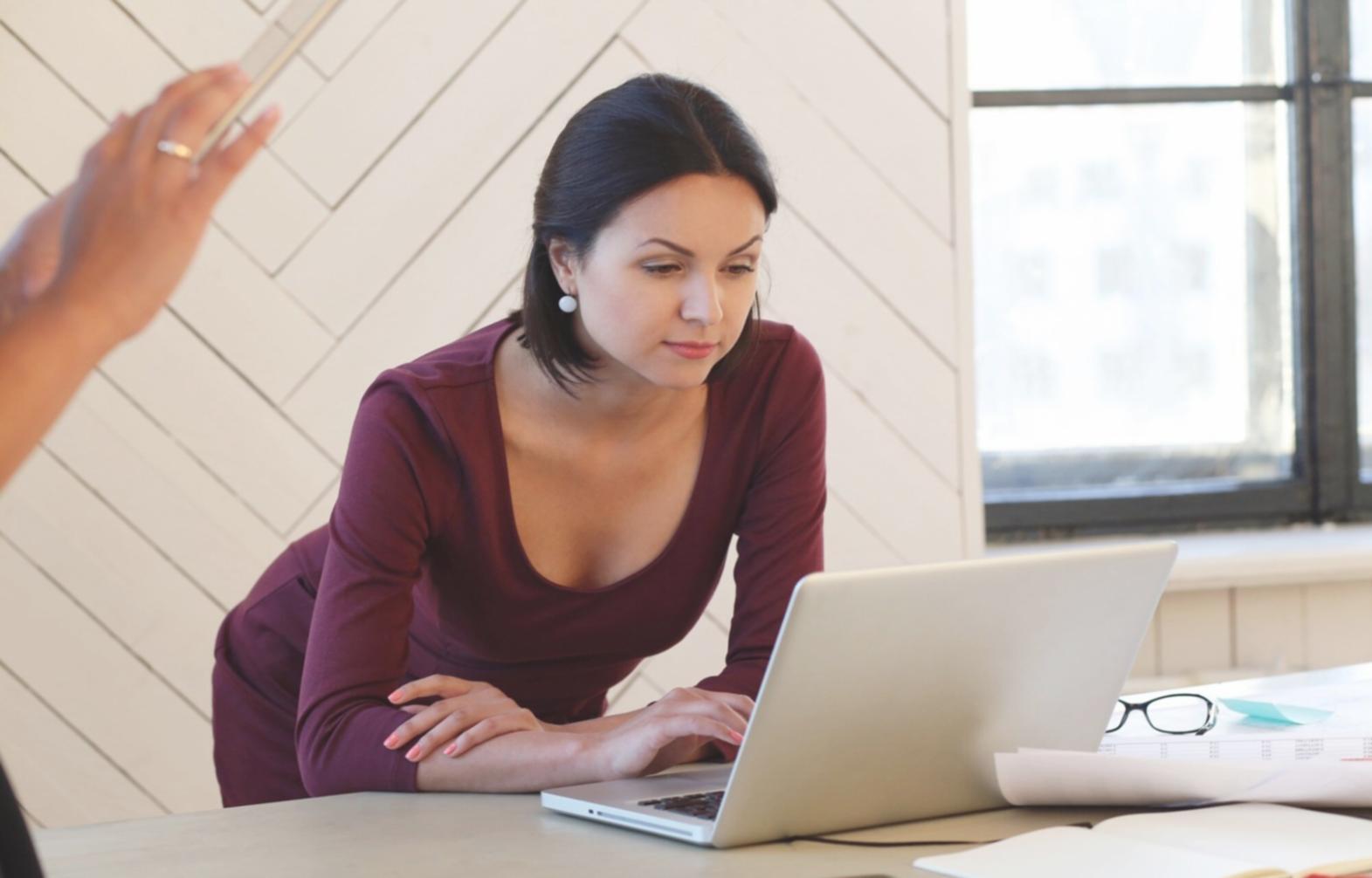 Professional team reviewing comprehensive financial analysis reports